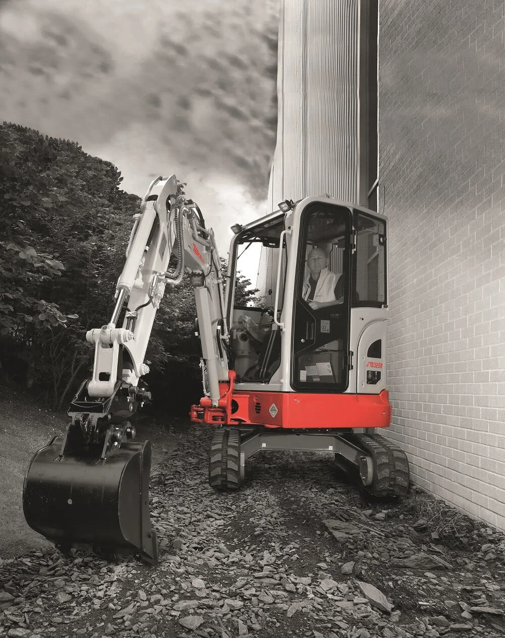 Takeuchi TB325R mini digger on a residential site in Essex